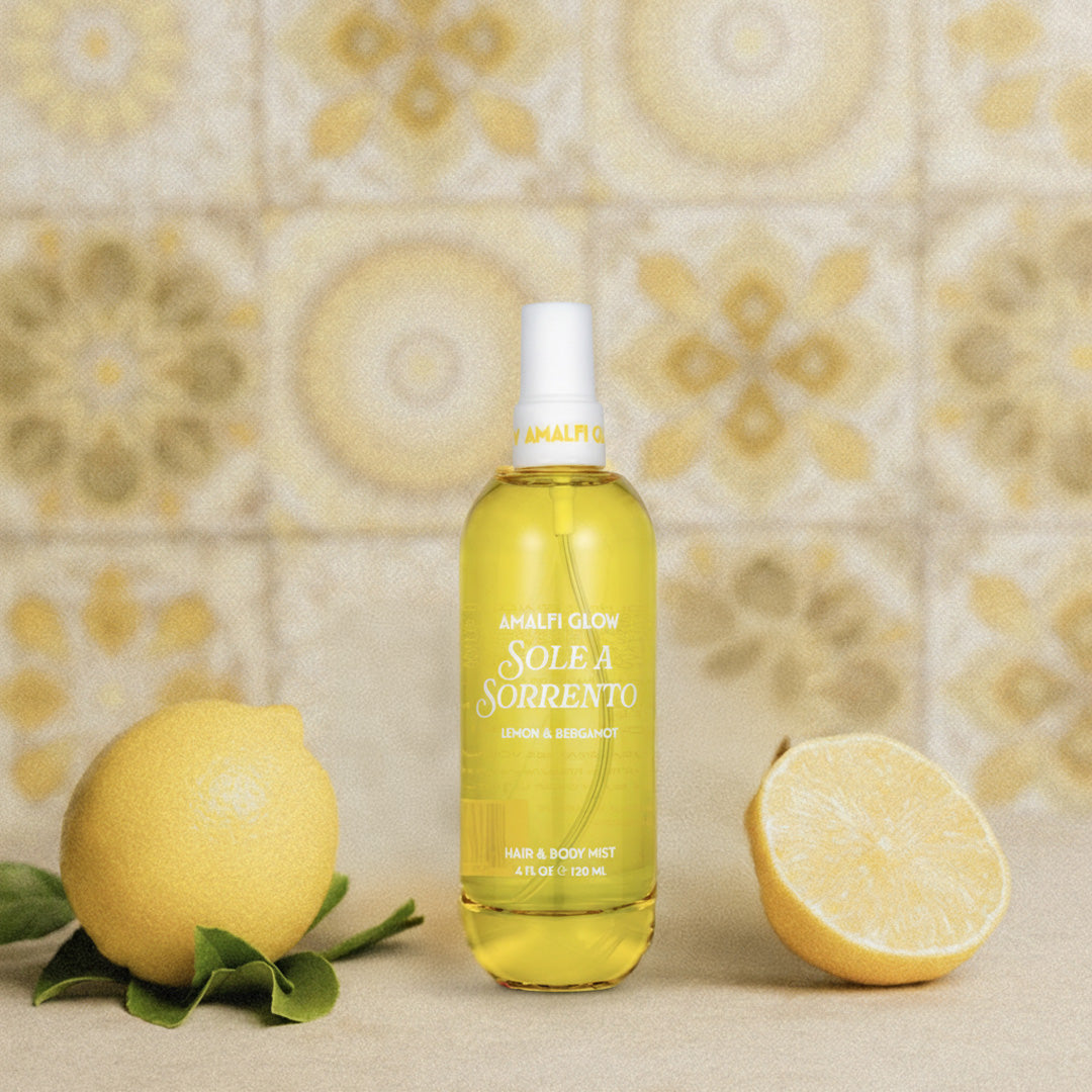 Bottle of Solea Sorrento with lemons on a floral-patterned background