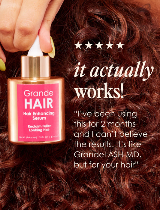 Grande Hair hair enhancing serum bottle with dropper on a light beige background