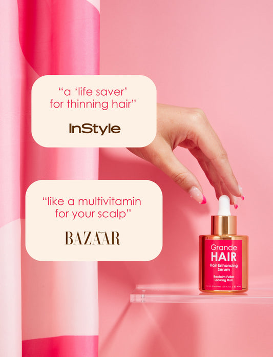 Grande Hair hair enhancing serum bottle with dropper on a light beige background