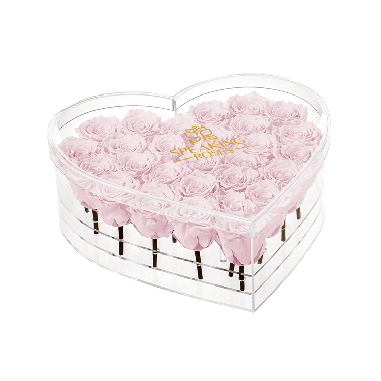 Heart-shaped box with pink roses and 'Bouquet Box' branding on a white background