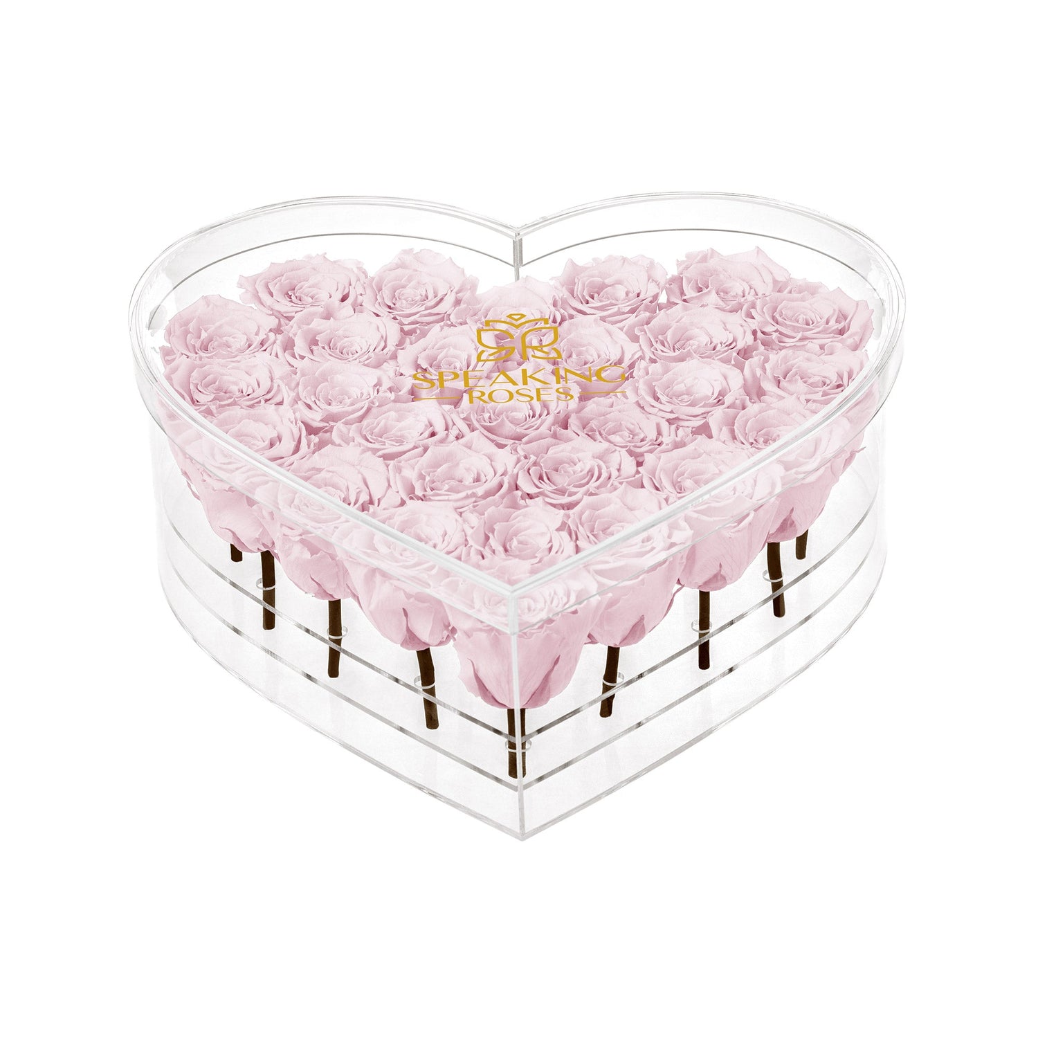 Heart-shaped box with pink roses and 'Bouqs' logo on a white background