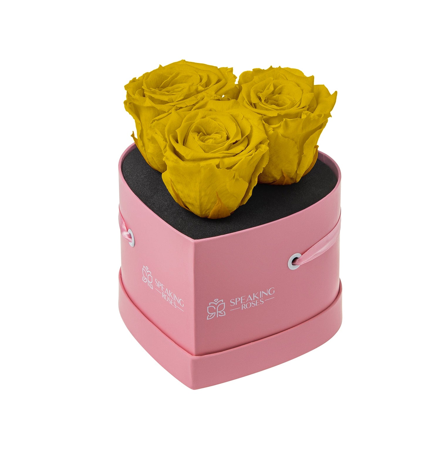 Pink heart-shaped box with yellow roses on a white background
