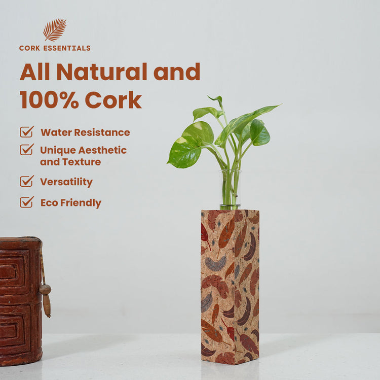 Cork vase with plant and cork essentials branding on a light gray background