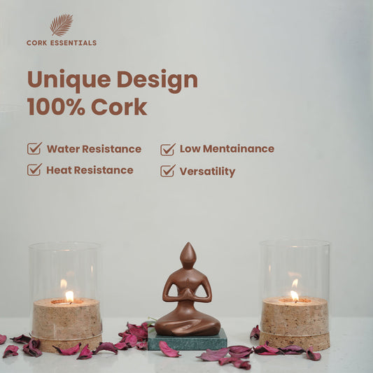 Two candle holders with candles inside on a white background