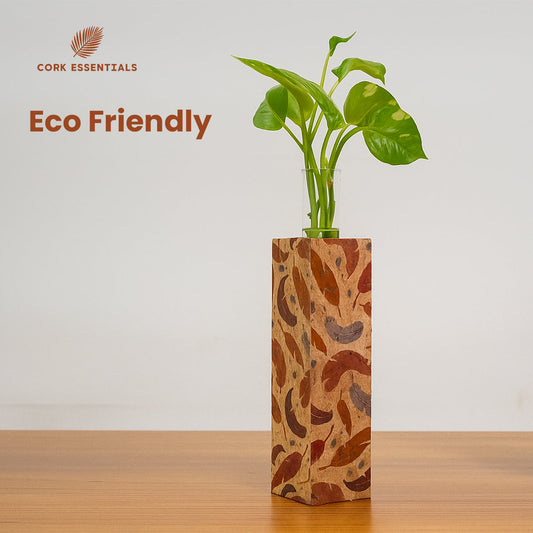 Decorative vase with a plant on a white background