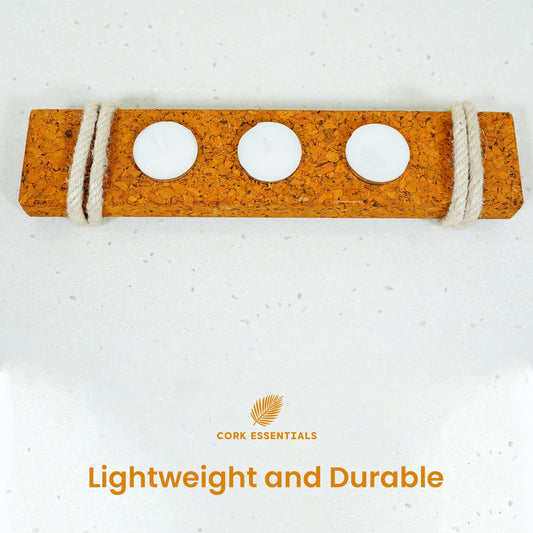 Cork board with three holes and a rope handle on a white background