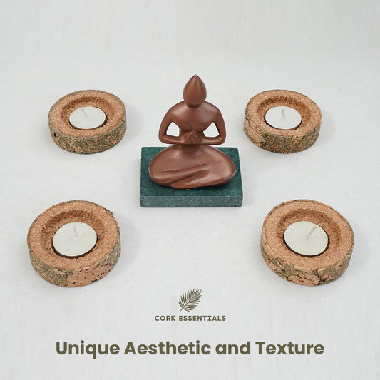 Set of four stone-look candles on a white background