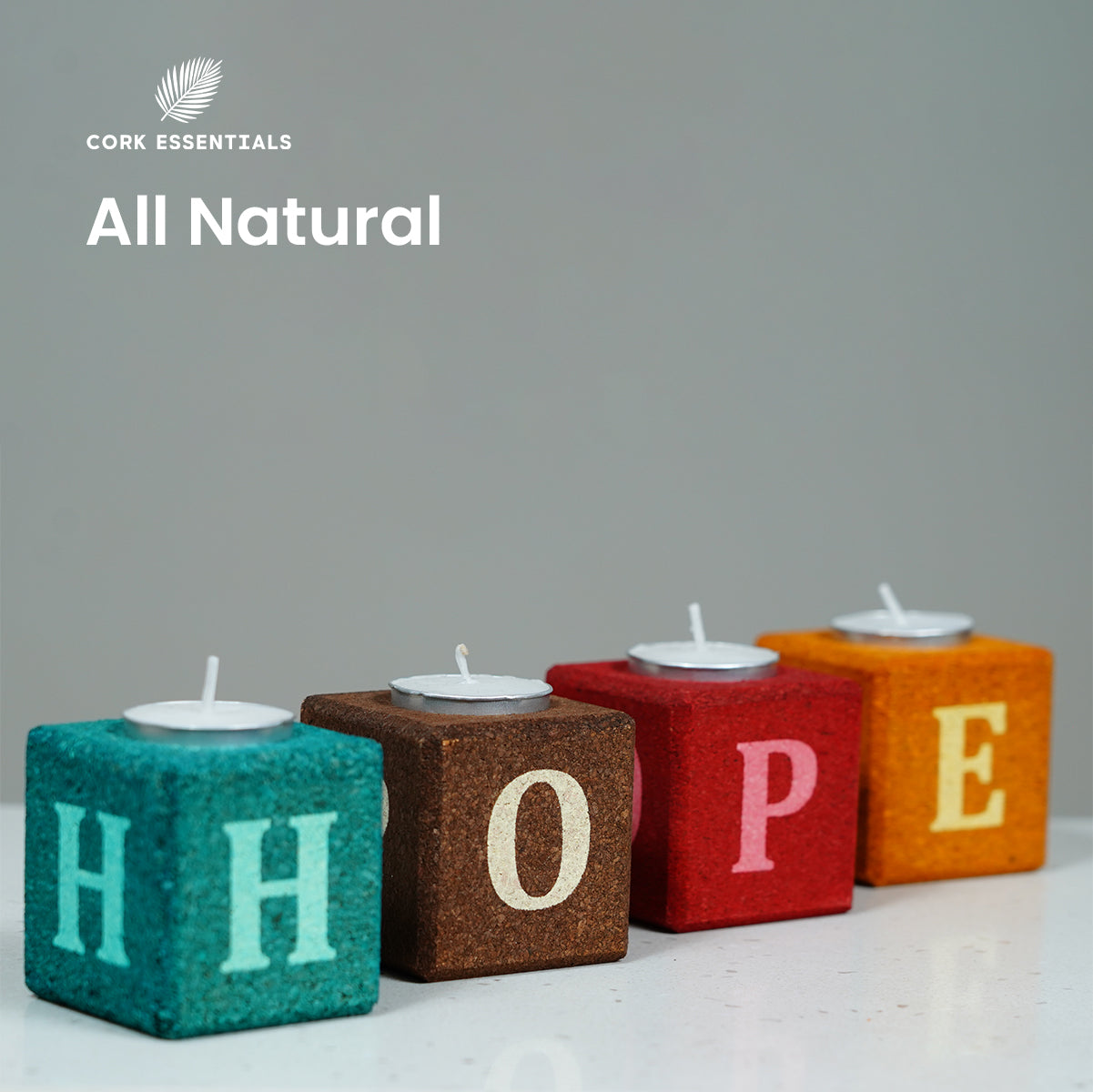 Colorful blocks with letters spelling 'HOPE' and cork brand logo on a gray background