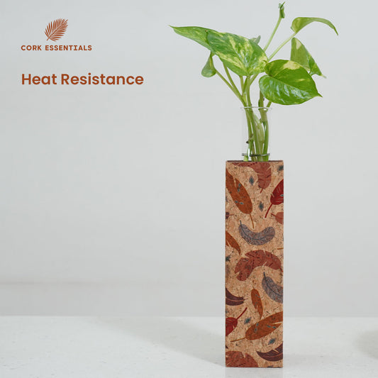 Decorative vase with a plant on a white background