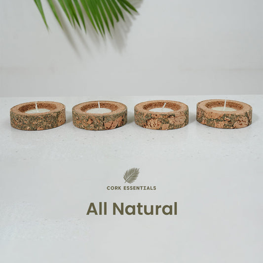 Set of four stone-look candles on a white background