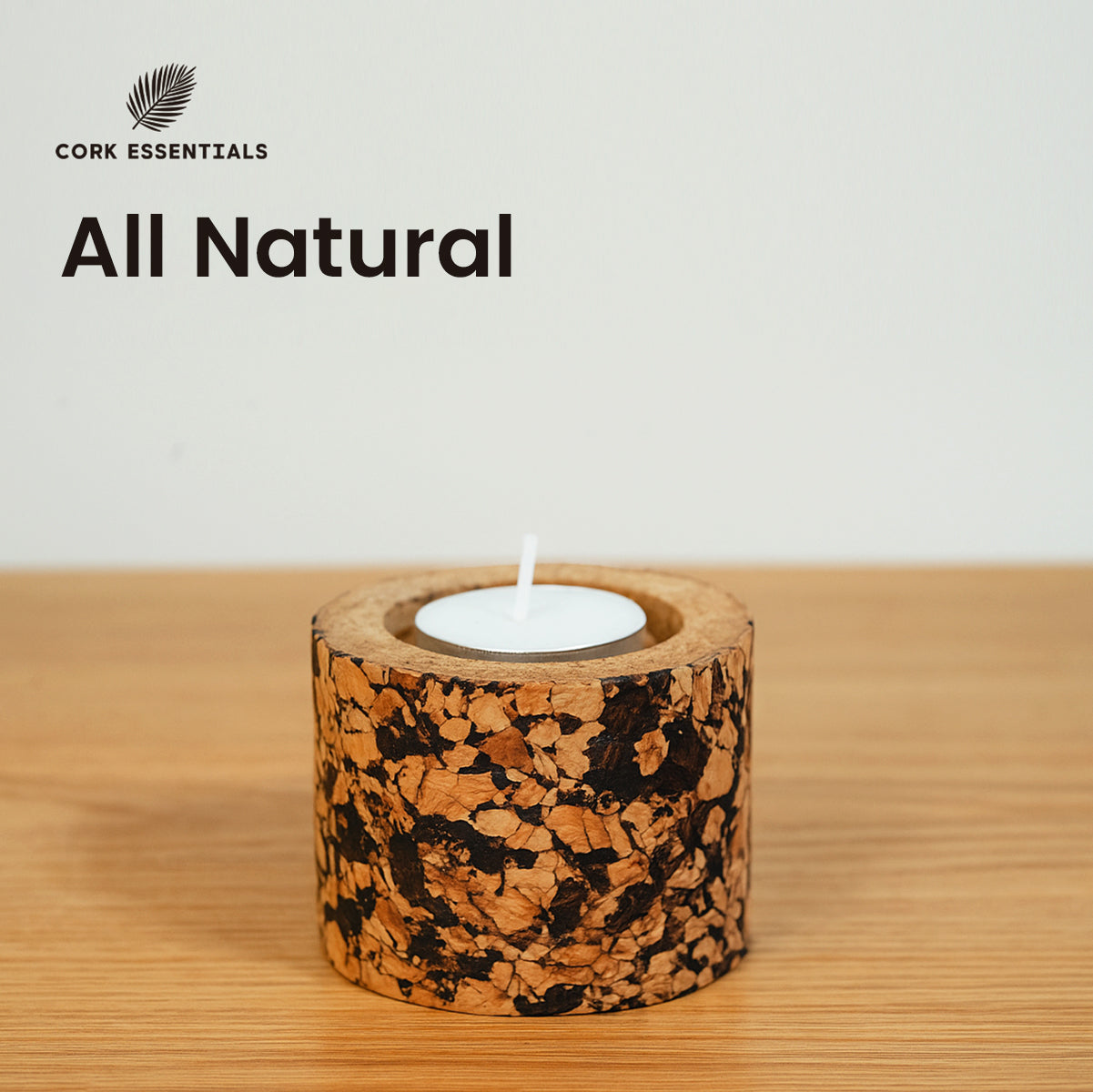 Cork candle holder with a lit candle on a wooden surface, branded 'Cork Essentials'.