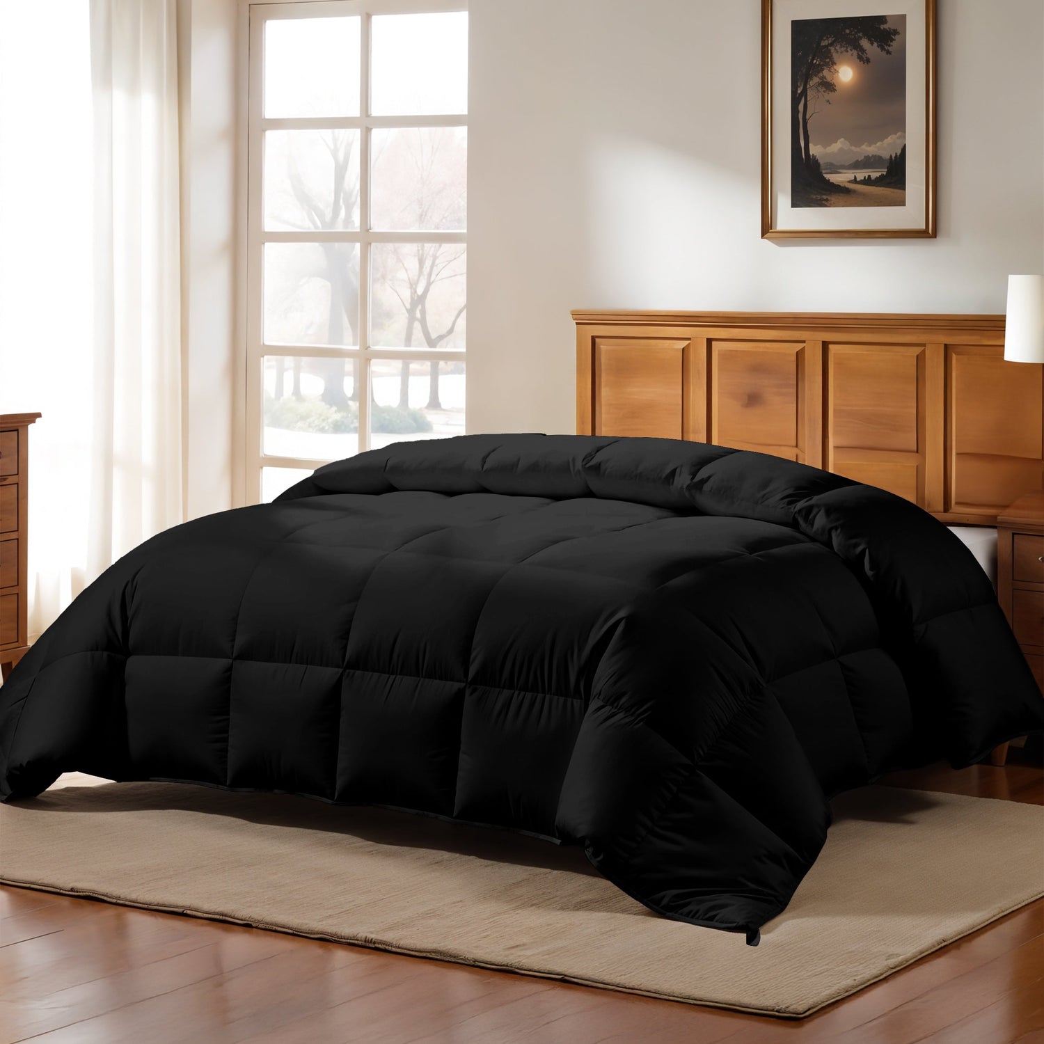 Black comforter on a bed in a bedroom with wooden furniture and a window.