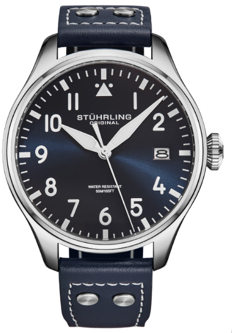 Stuhrling watch with blue leather strap and black dial on a white background