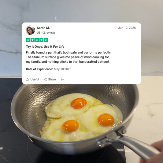 Stainless steel frying pan with textured surface on a white background