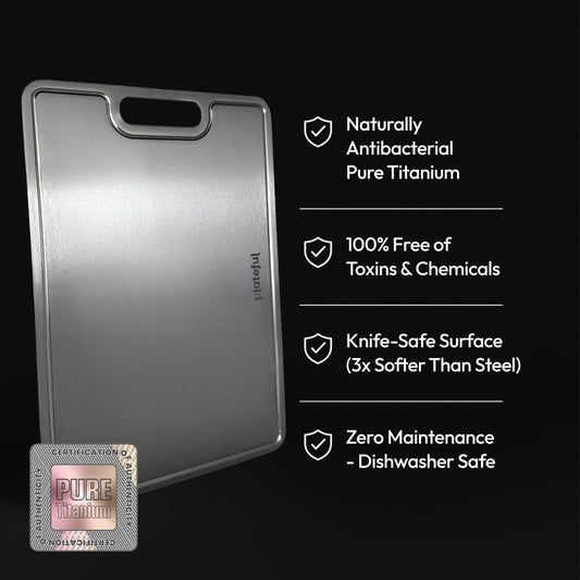 Gray cutting board with a handle on a white background