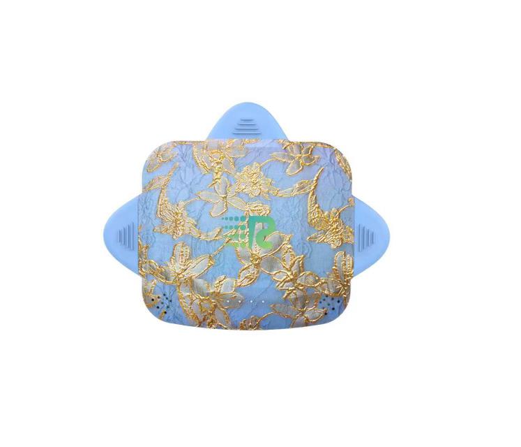 Blue and gold decorative item on a white background