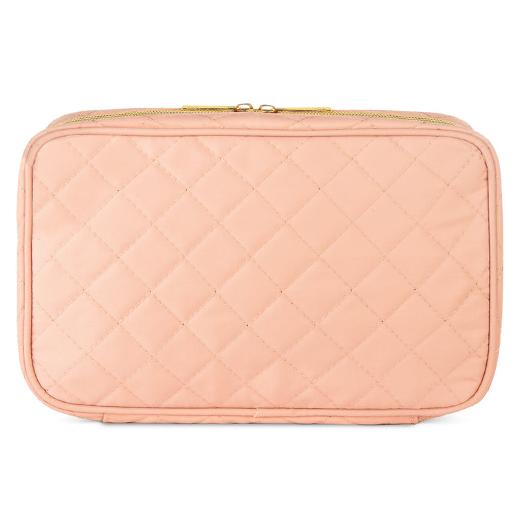 Quilted pink cosmetic bag on a white background