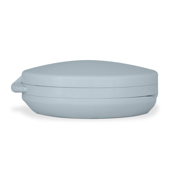 Light blue ceramic dish with lid on a white background