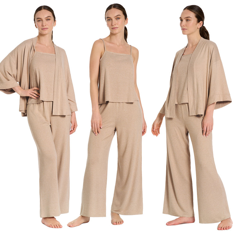 Woman wearing a beige loungewear set on a white background