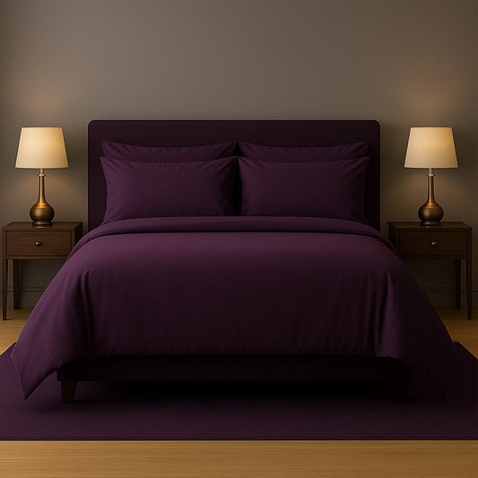 Neatly made bed with beige bedding in a bedroom setting.