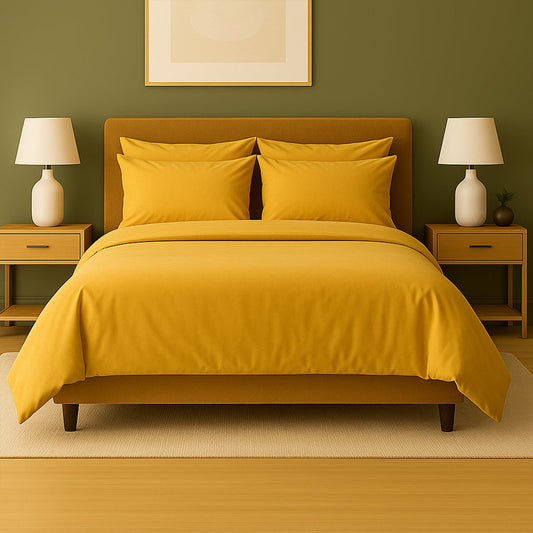 Neatly made bed with beige bedding in a bedroom setting.
