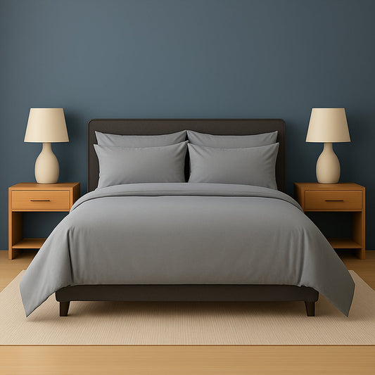 Neatly made bed with beige bedding in a bedroom setting.