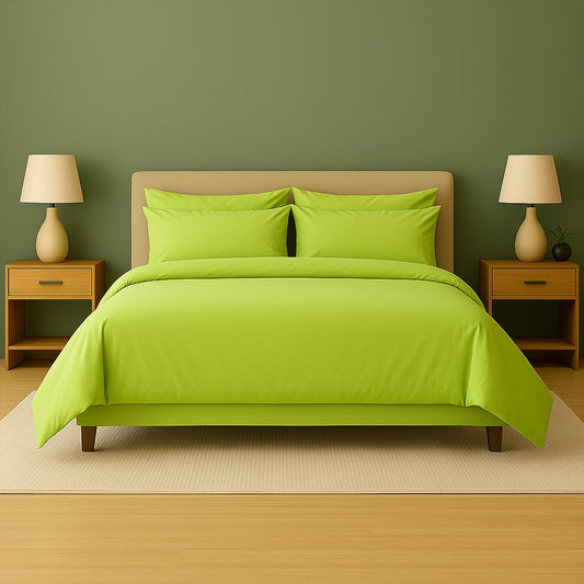 Neatly made bed with white bedding and pillows in a room with wooden nightstands and lamps.