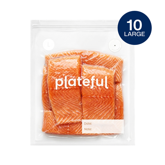 Packaged avocados in a clear plastic bag with 'plateful' branding on a white background.