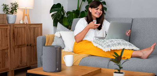 Miko smart device with smartphone displaying app interface on a white background