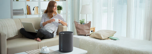 Miko smart device with smartphone displaying app interface on a white background