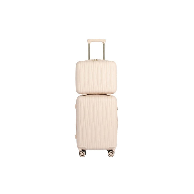 Beige suitcase with ribbed texture on a white background
