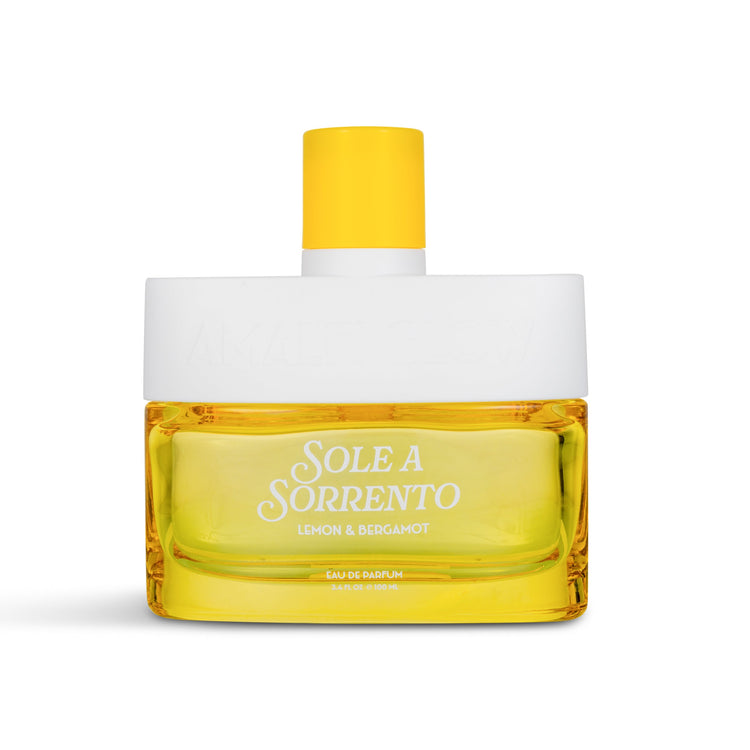 Perfume bottle labeled 'Sole a Sorrento' with yellow cap on a white background