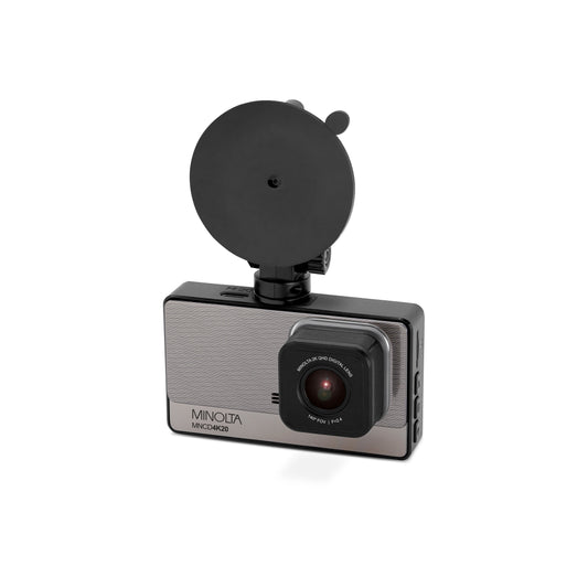 A Minolta Micromax motion detector camera with a black suction mount, shown on a solid white background.