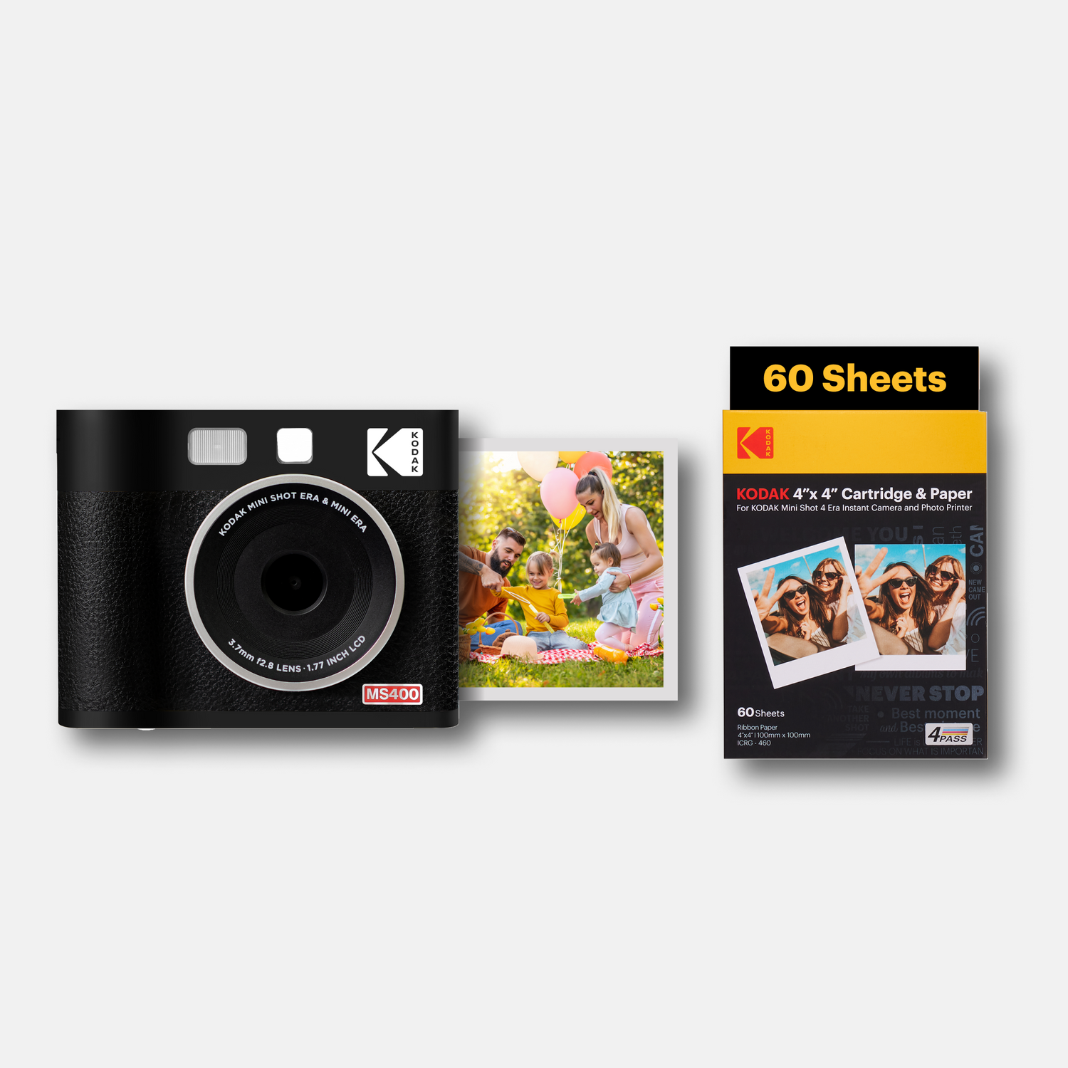 Kodak instant camera and photo paper pack on a white background