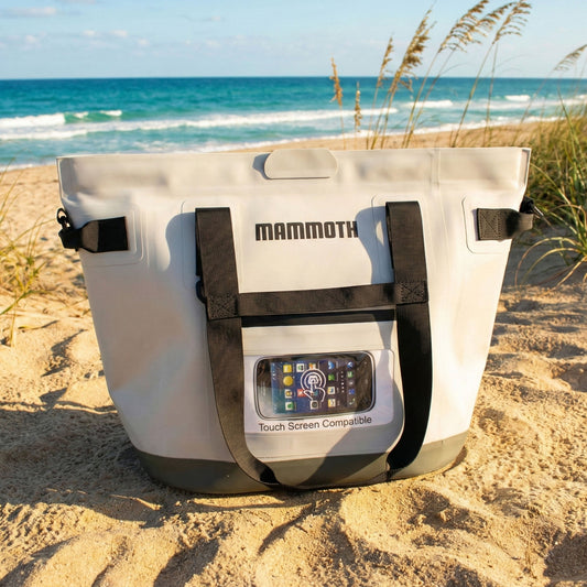 Mammoth cooler bag on a sandy beach with ocean in the background