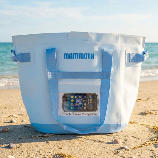 Mammoth cooler bag on a sandy beach with ocean view