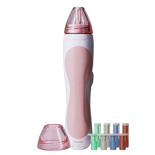 Pink and white electronic device with interchangeable nozzles on a white background
