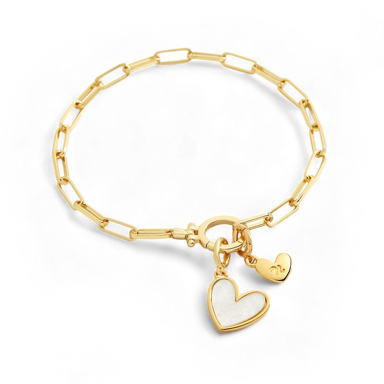 Gold bracelet with heart-shaped charms on a white background