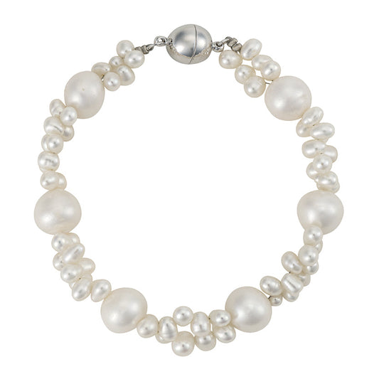 Pearl bracelet with silver clasp on a white background