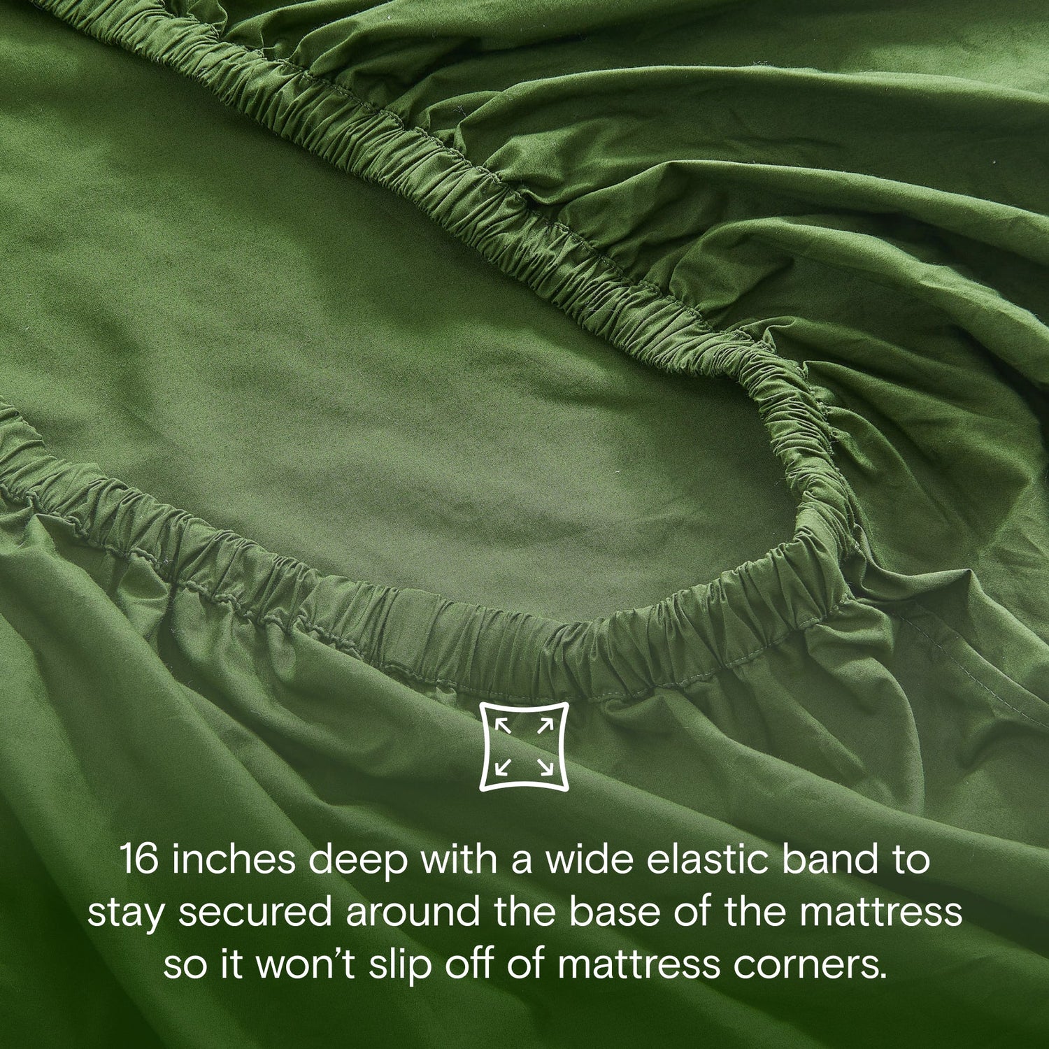 Green fitted sheet with elastic band on mattress