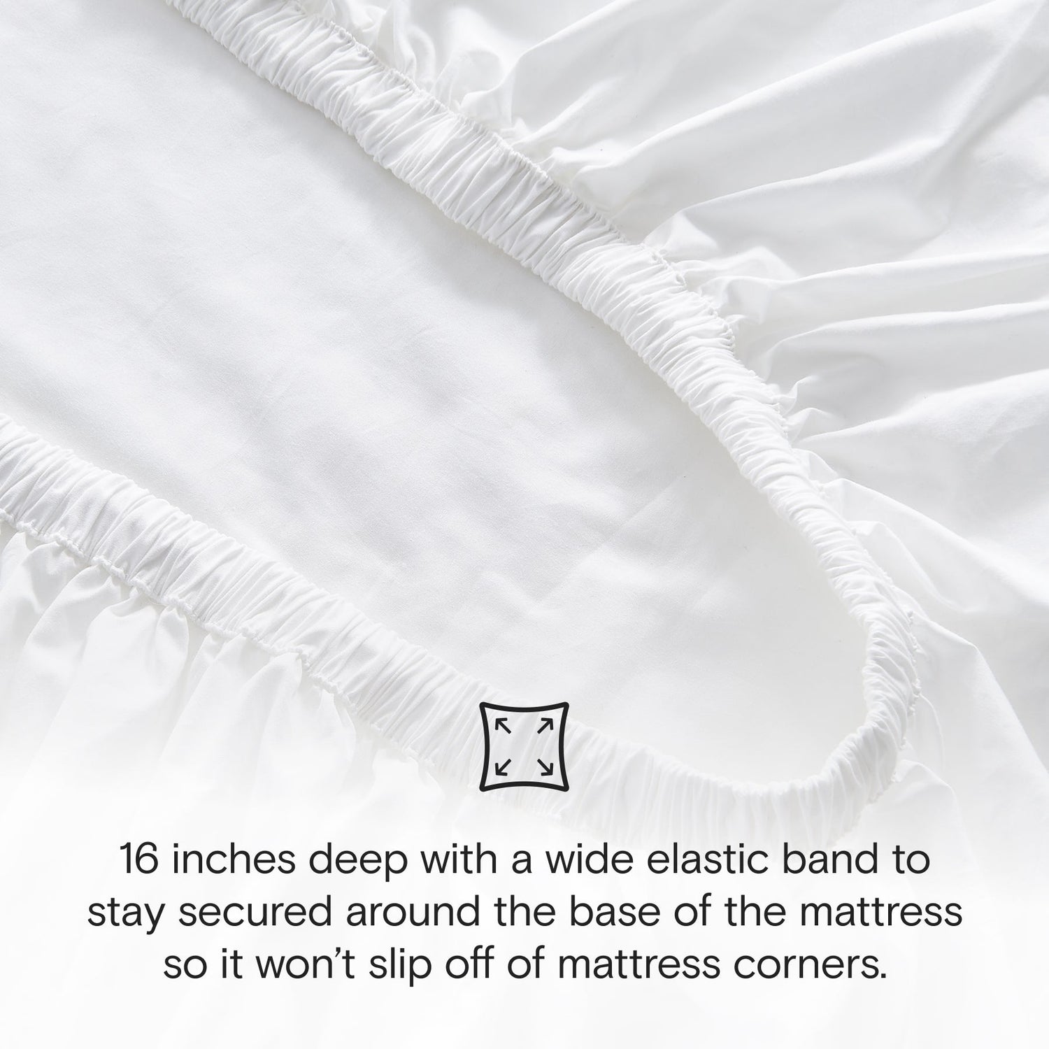 White fitted sheet with elastic band on mattress corner