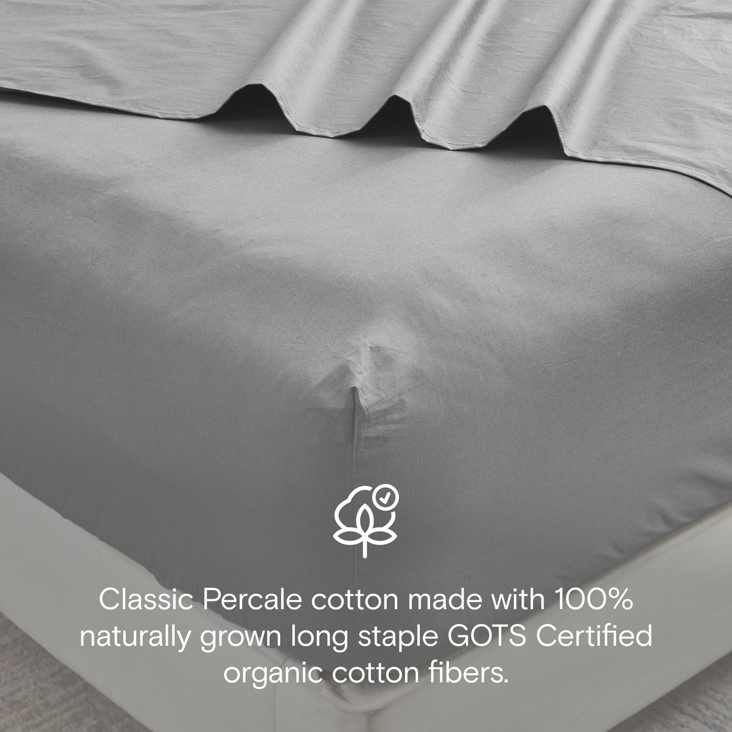 Gray percale cotton sheet set with GOTS certification logo and text.