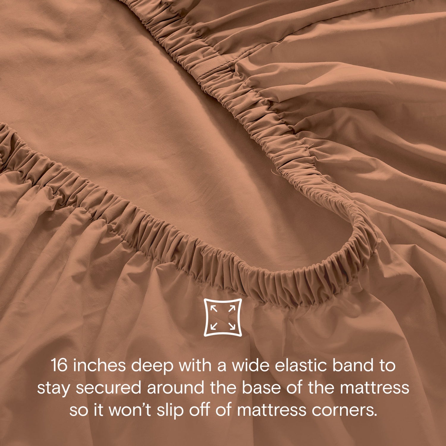 Brown fitted sheet with elastic band on mattress corner, text describing feature.