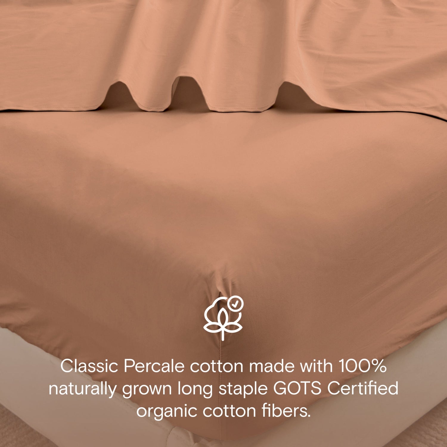 Brown bed sheets with GOTS certification logo and text on a neutral background