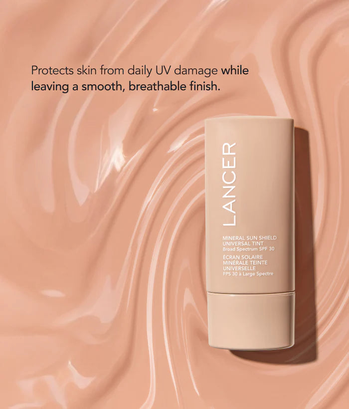 Lancer sunscreen bottle on a swirled peach background with text about UV protection.