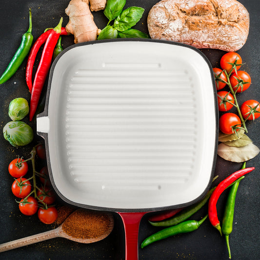 Red square enamel cast iron grill pan on a white background