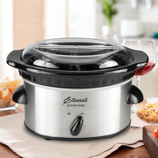 Stainless steel slow cooker with glass lid on a white background, branded 'Eternal Kitchen Ideas'.