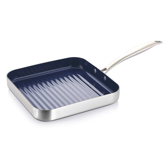 Stainless steel grill pan with a blue non-stick coating on a white background