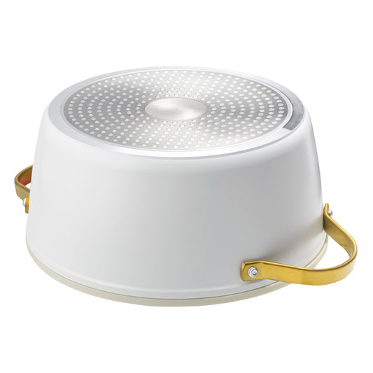 White ceramic pot with gold handles on a white background