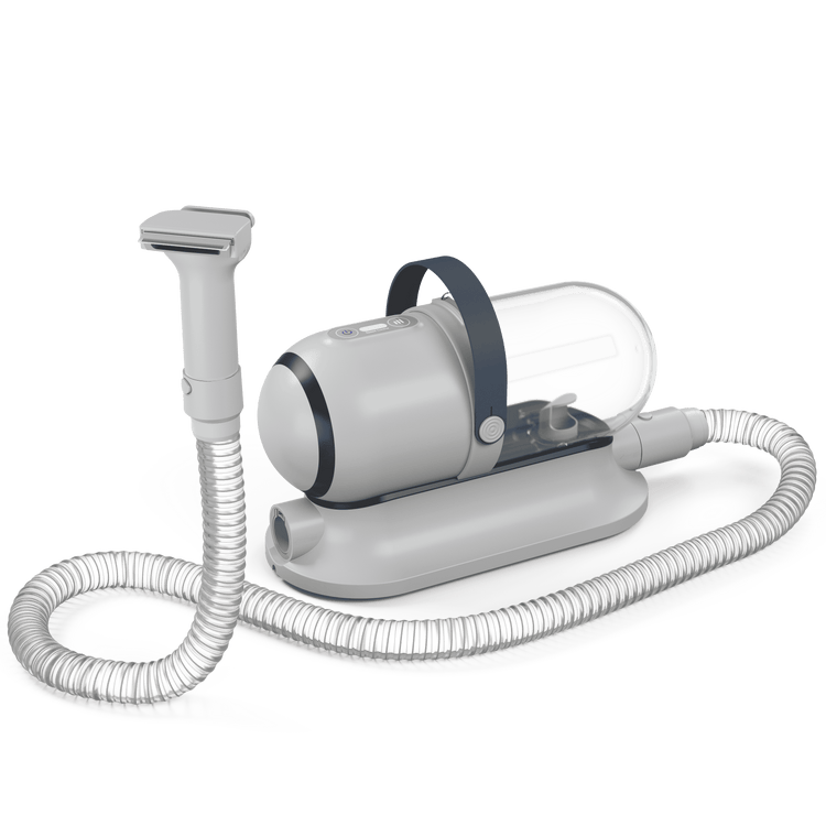 White and gray medical device with hose on a white background